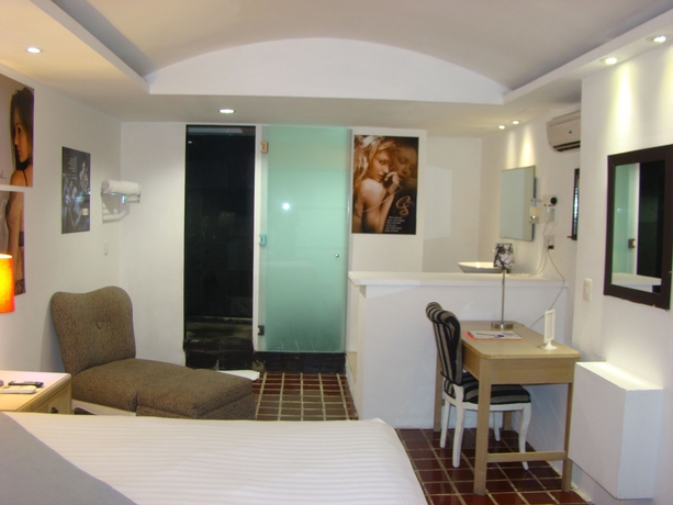 Imagen de la habitación del Hotel Mayafair Design. Foto 5