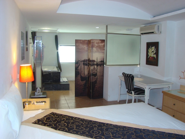 Imagen de la habitación del Hotel Mayafair Design. Foto 7