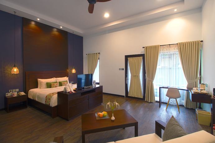 Imagen de la habitación del Hotel Mayang Sari Beach Resort. Foto 7