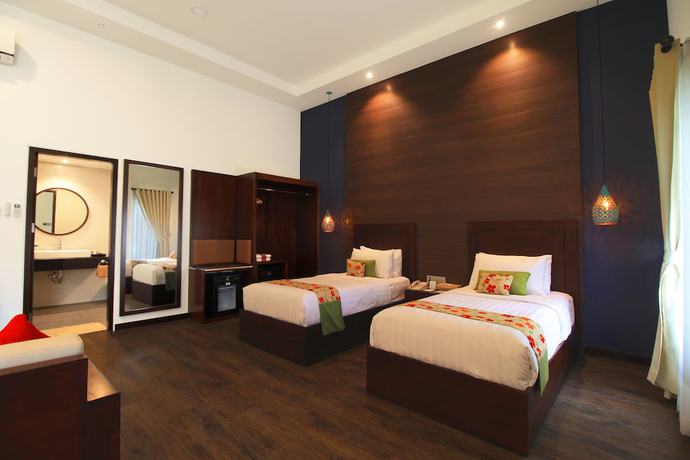 Imagen de la habitación del Hotel Mayang Sari Beach Resort. Foto 8