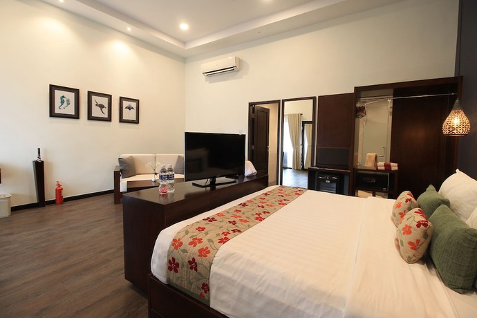 Imagen de la habitación del Hotel Mayang Sari Beach Resort. Foto 9