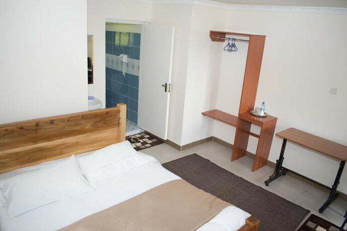 Imagen de la habitación del Hotel Maya\'s Guest House. Foto 19