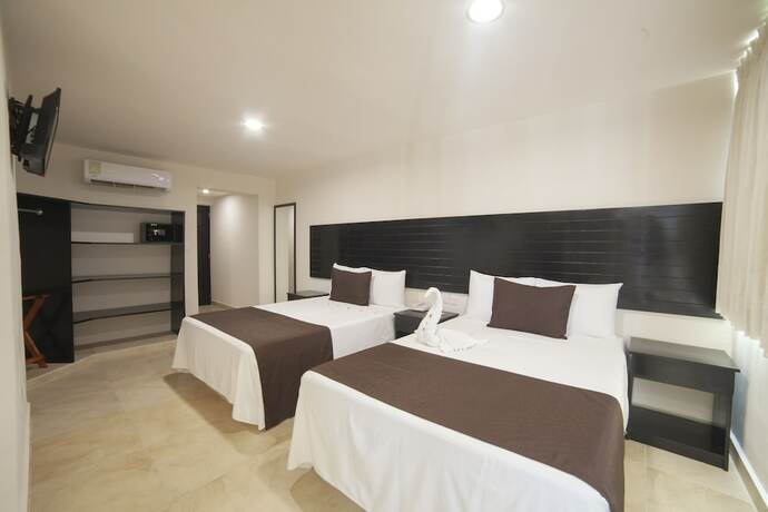 Imagen de la habitación del Hotel Mayev Express. Foto 20