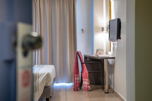 Imagen de la habitación del Hotel Mayfair Gardens. Foto 6