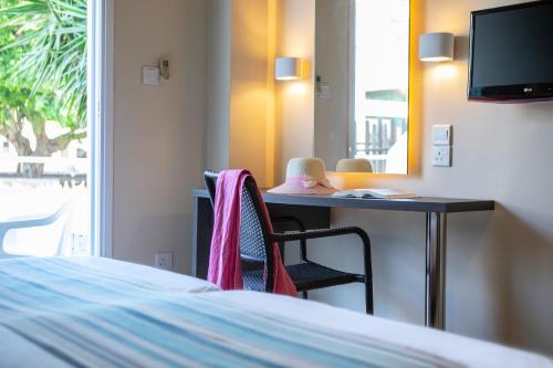 Imagen de la habitación del Hotel Mayfair Gardens. Foto 7