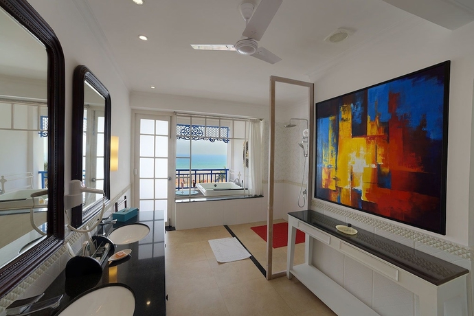 Imagen de la habitación del Hotel Mayfair Palm Beach Resort. Foto 4