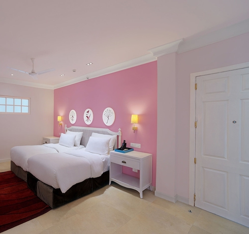 Imagen de la habitación del Hotel Mayfair Palm Beach Resort. Foto 13