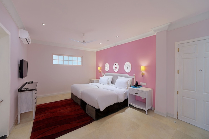 Imagen de la habitación del Hotel Mayfair Palm Beach Resort. Foto 17