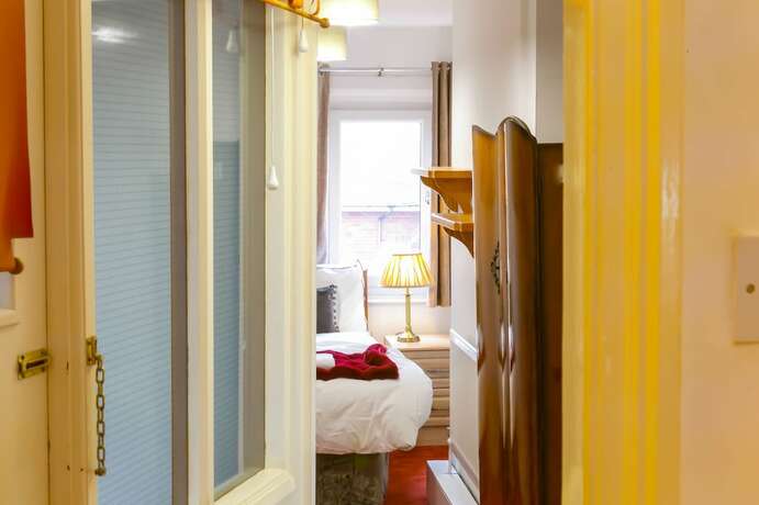 Imagen de la habitación del Hotel Mayfield Apartments. Foto 11