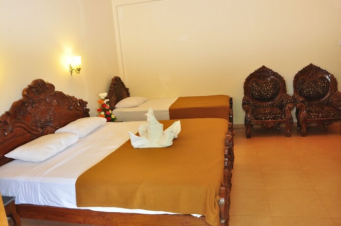 Imagen de la habitación del Hotel Mayflower Beach Resort. Foto 21