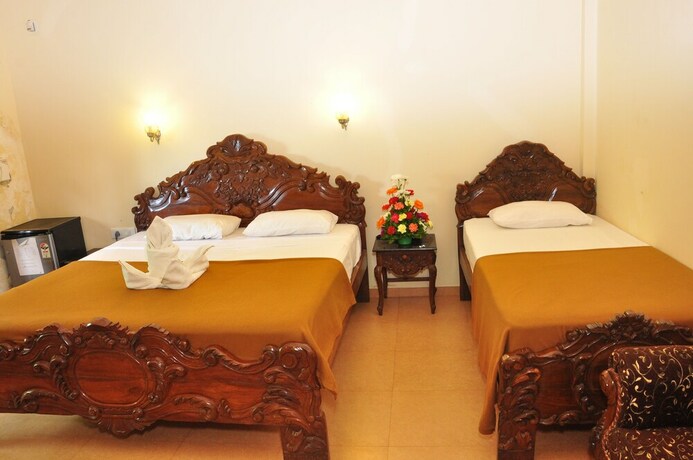 Imagen de la habitación del Hotel Mayflower Beach Resort. Foto 24