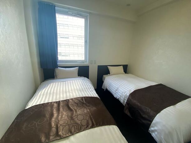 Imagen de la habitación del Hotel Mayflower Sendai. Foto 13