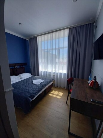 Imagen de la habitación del Hotel Maykop. Foto 15