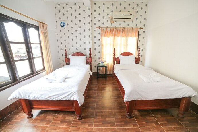 Imagen de la habitación del Hotel Maylay Guesthouse. Foto 14
