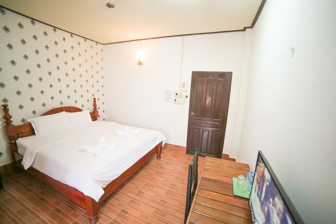 Imagen de la habitación del Hotel Maylay Guesthouse. Foto 17