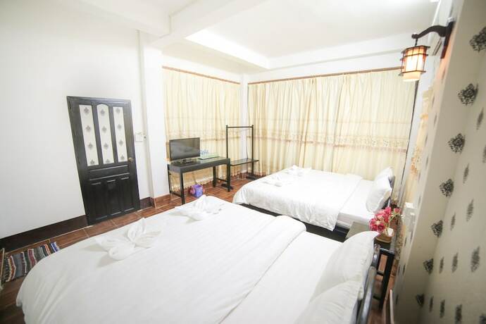 Imagen de la habitación del Hotel Maylay Guesthouse. Foto 19