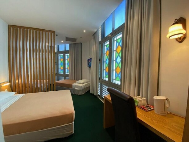 Imagen de la habitación del Hotel Mayo Inn. Foto 8