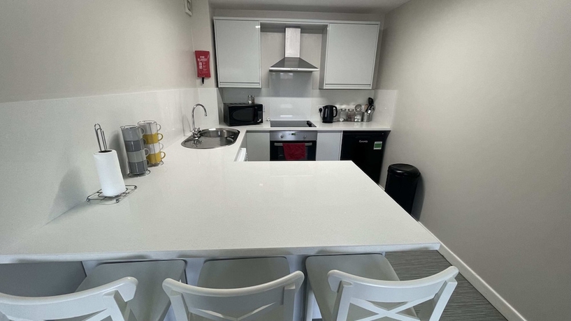 Imagen de la habitación del Hotel Mays Apartments. Foto 8