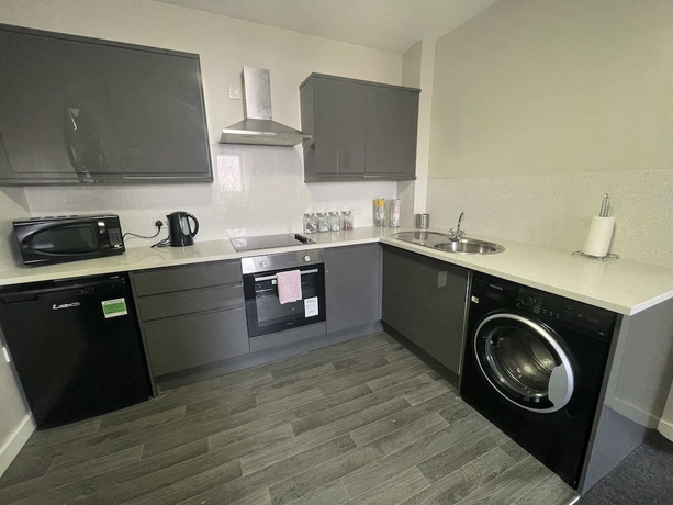 Imagen de la habitación del Hotel Mays Apartments. Foto 9