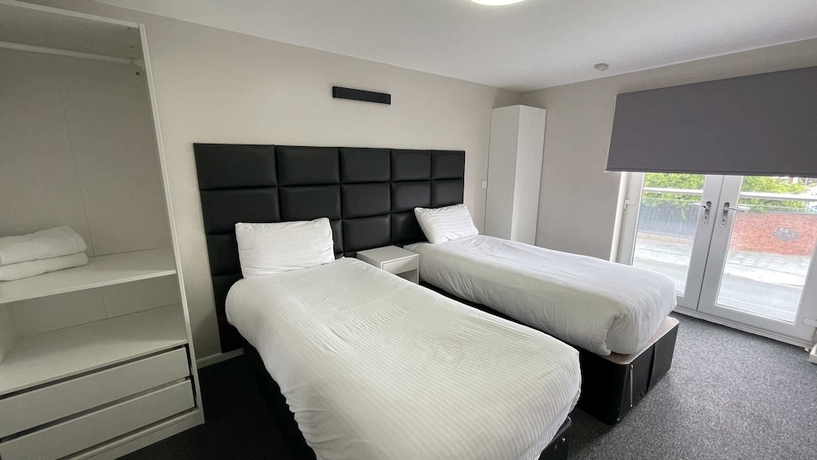 Imagen de la habitación del Hotel Mays Apartments. Foto 11