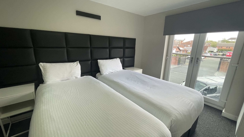 Imagen de la habitación del Hotel Mays Apartments. Foto 13