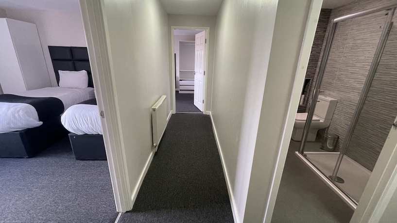 Imagen de la habitación del Hotel Mays Apartments. Foto 15