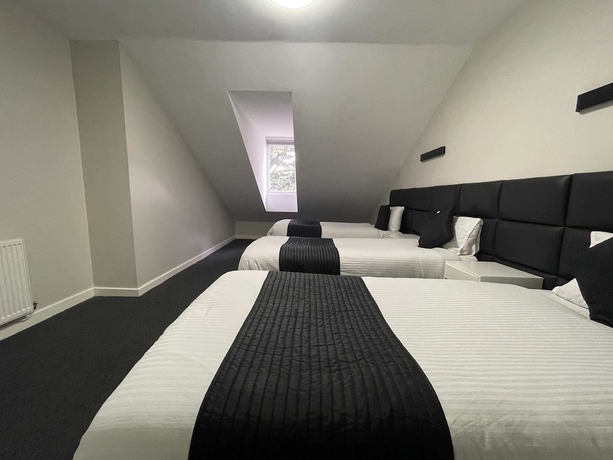 Imagen de la habitación del Hotel Mays Apartments. Foto 18