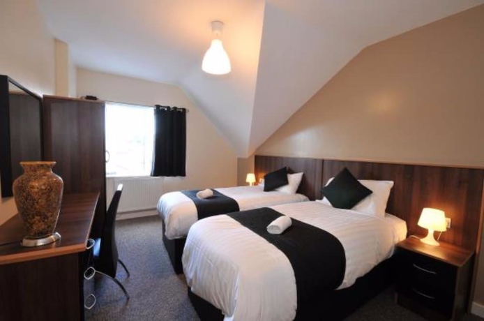 Imagen de la habitación del Hotel May's House. Foto 3