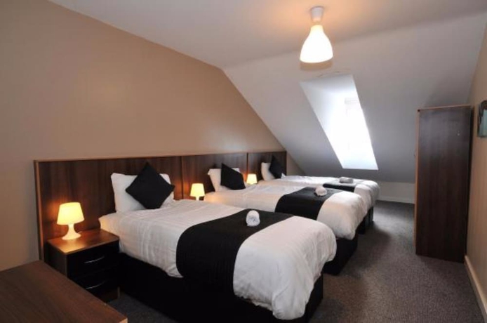 Imagen de la habitación del Hotel May's House. Foto 4
