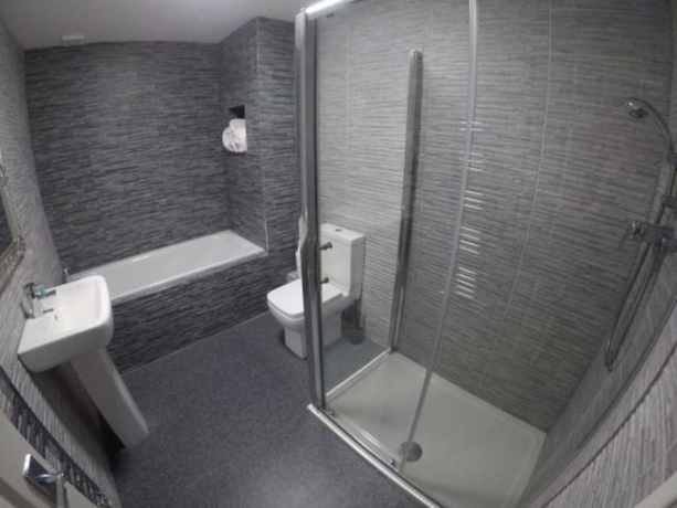 Imagen de la habitación del Hotel May's House. Foto 10