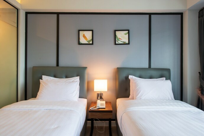 Imagen de la habitación del Hotel Mayson Place. Foto 13