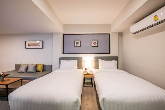 Imagen de la habitación del Hotel Mayson Place. Foto 18