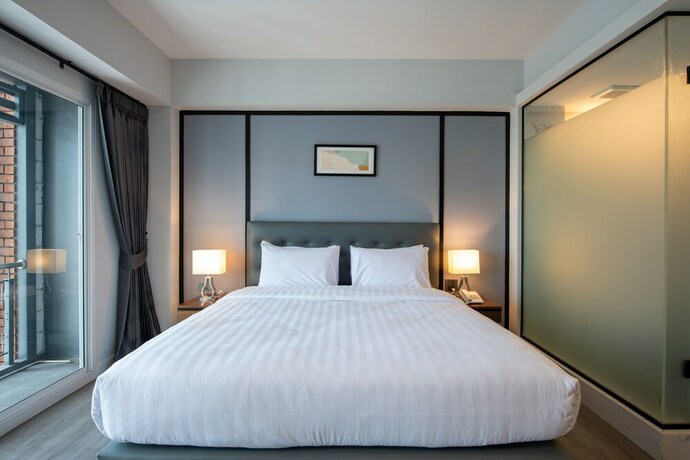 Imagen de la habitación del Hotel Mayson Place. Foto 19