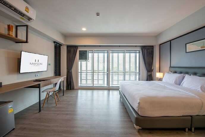 Imagen de la habitación del Hotel Mayson Place. Foto 24