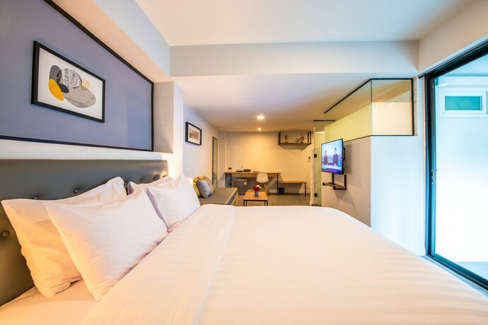 Imagen de la habitación del Hotel Mayson Place. Foto 26