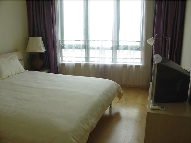 Imagen de la habitación del Hotel Mayson Shanghai Pudong Serviced Apartment. Foto 4