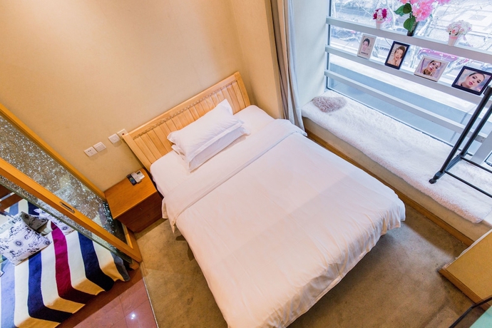 Imagen de la habitación del Hotel Mayson Shanghai Zhongshan Park Serviced Apartment. Foto 11