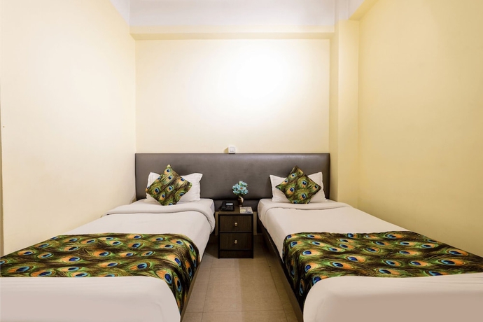 Imagen de la habitación del Hotel Mayur, Guwahati. Foto 3