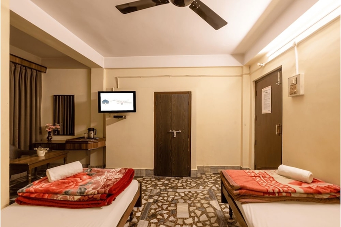 Imagen de la habitación del Hotel Mayur, Guwahati. Foto 11