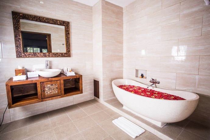 Imagen de la habitación del Hotel Mayura Ubud Retreat. Foto 5