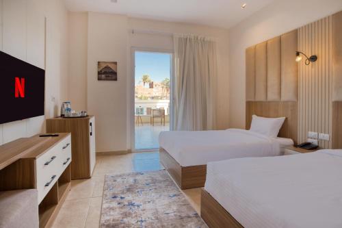 Imagen de la habitación del Hotel Mazar Pyramids. Foto 17