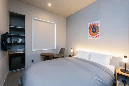 Imagen de la habitación del Hotel Mazarium. Foto 20