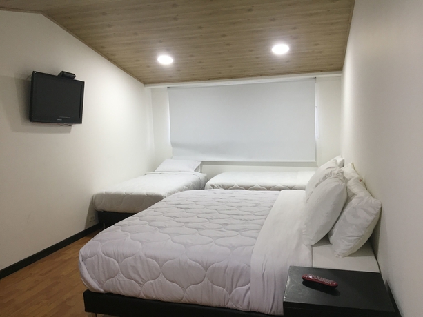 Imagen de la habitación del Hotel Mb Boutique. Foto 10