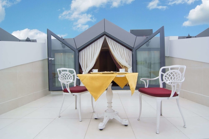 Imagen de la habitación del Hotel Mb Deluxe. Foto 5