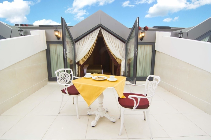 Imagen de la habitación del Hotel Mb Deluxe. Foto 13