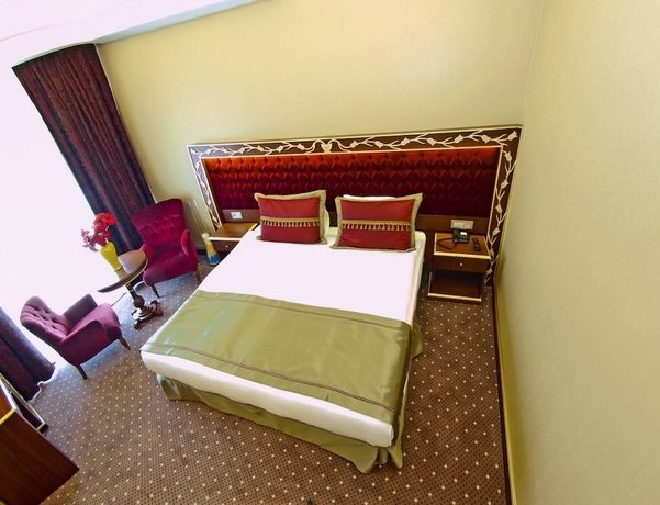 Imagen de la habitación del Hotel Mb Deluxe. Foto 14