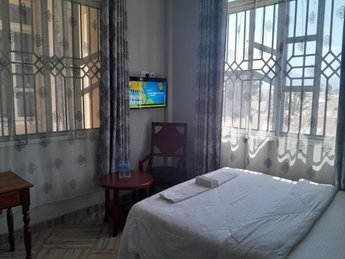 Imagen de la habitación del Hotel Mbeya Starinn. Foto 19