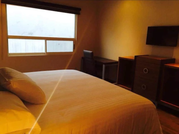 Imagen de la habitación del Hotel Mbm Red Sun. Foto 4