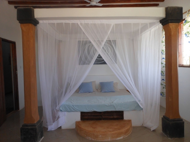 Imagen de la habitación del Hotel Mbuyuni Beach Village - Bungalows. Foto 2