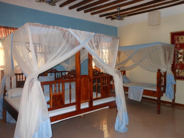 Imagen de la habitación del Hotel Mbuyuni Beach Village - Bungalows. Foto 10
